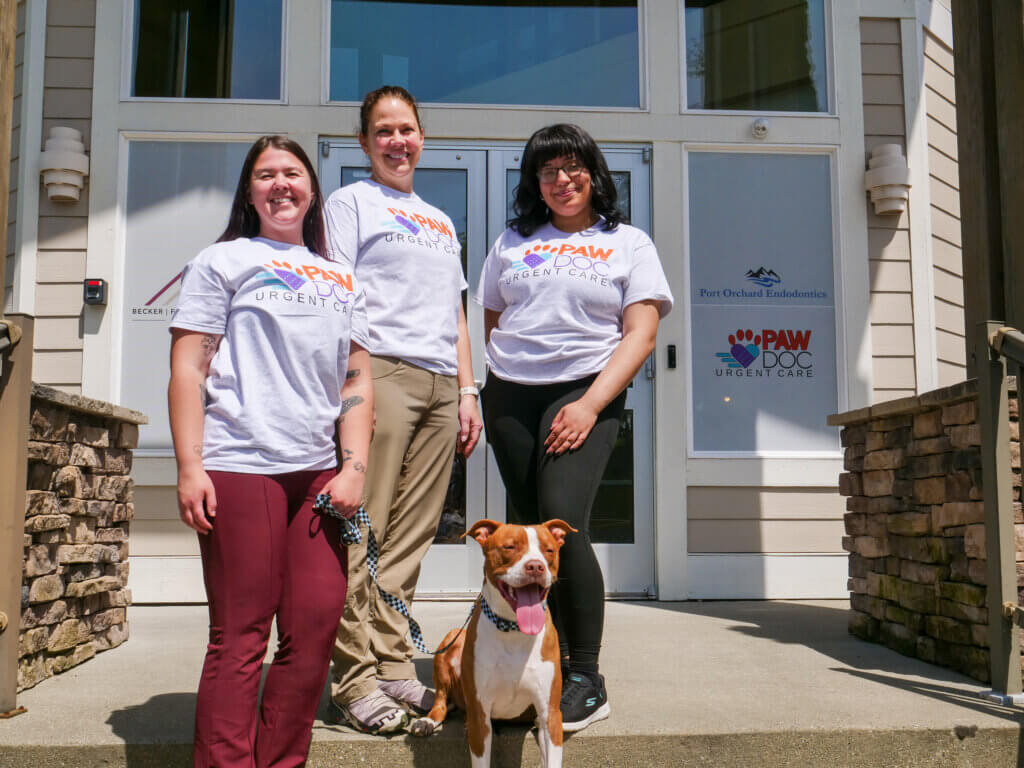 PawDoc Urgent Care Pet Clinic Team in front of Urgent Care Clinic